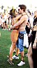 Sarah Hyland and boyfriend Dominic Sherwood share a cute kiss while attending Coachella in Indio, CA.
