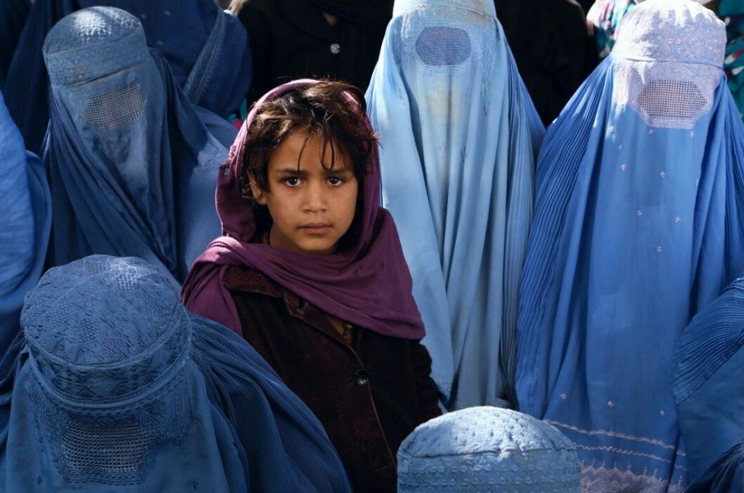 Afghanska kvinnor i burka och en flicka. Foto: Kodex Afghanistan women health
