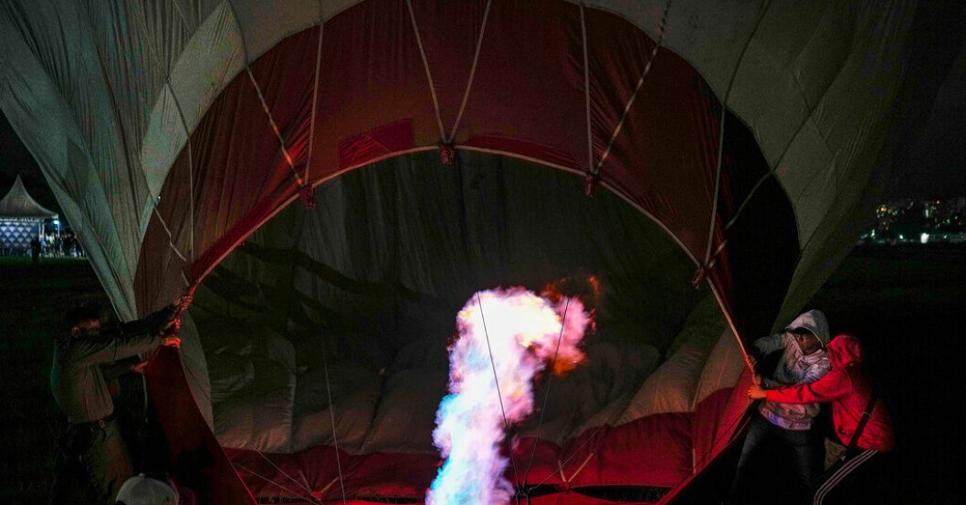 Ballongen fattade eld. Arkivbild. Sju skadade i ballongolycka