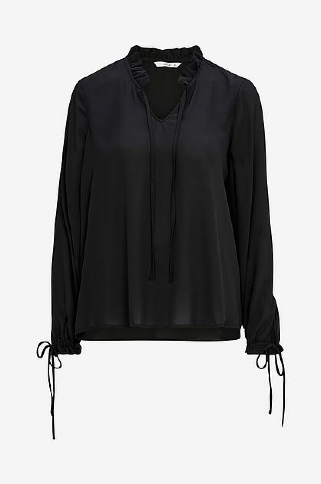 Blus med volang