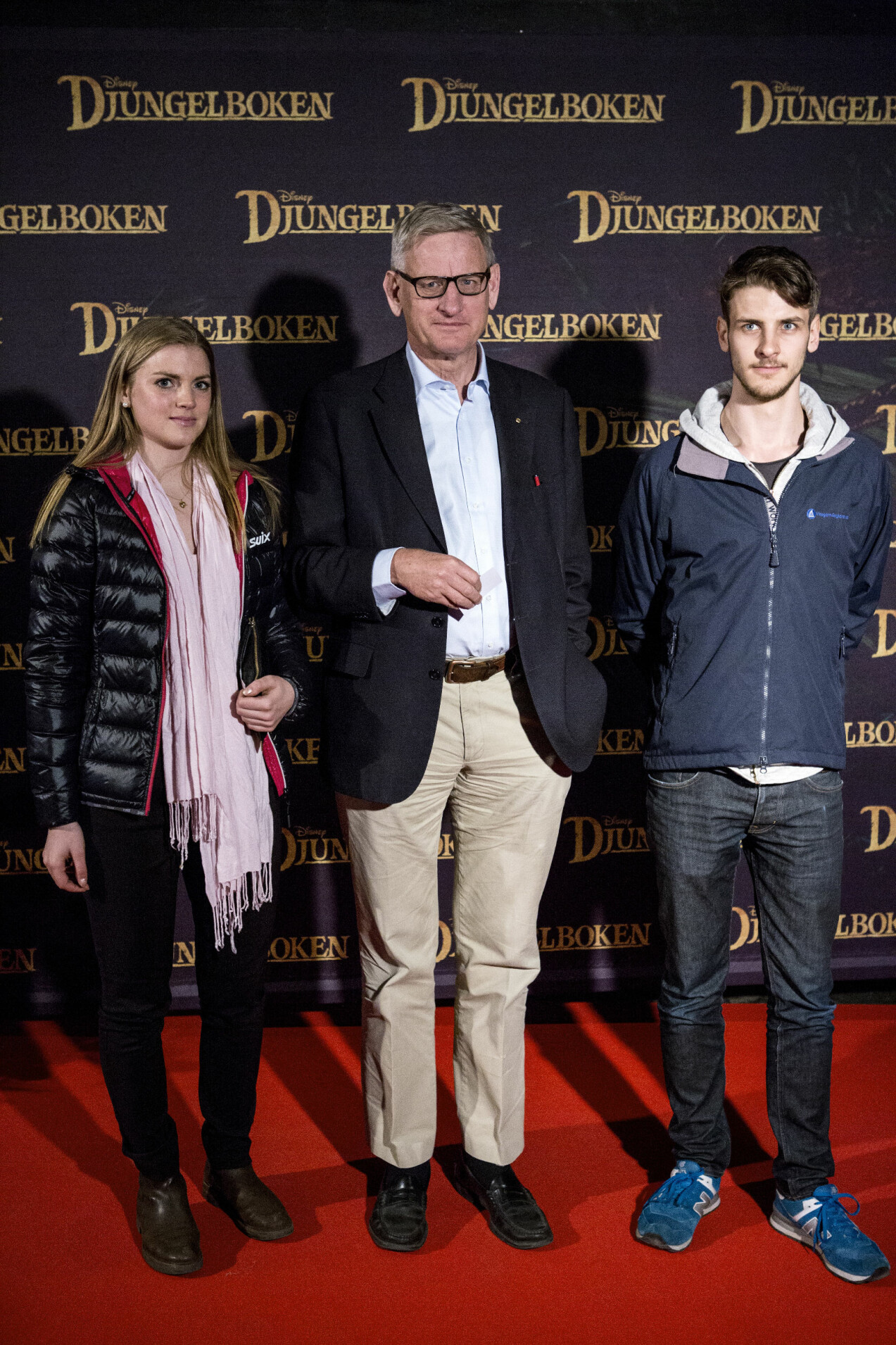 Carl Bildt och sonen Nils med flickvännen Beatrice.