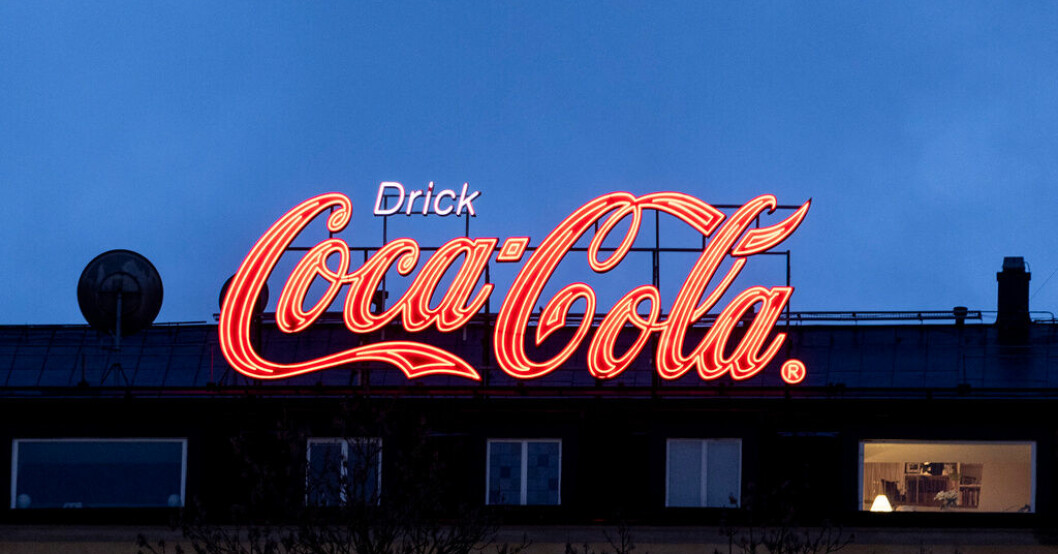 Coca-Cola-skylten vid Slussen i Stockholm. Arkivbild. Bättre än väntat från Coca-Cola