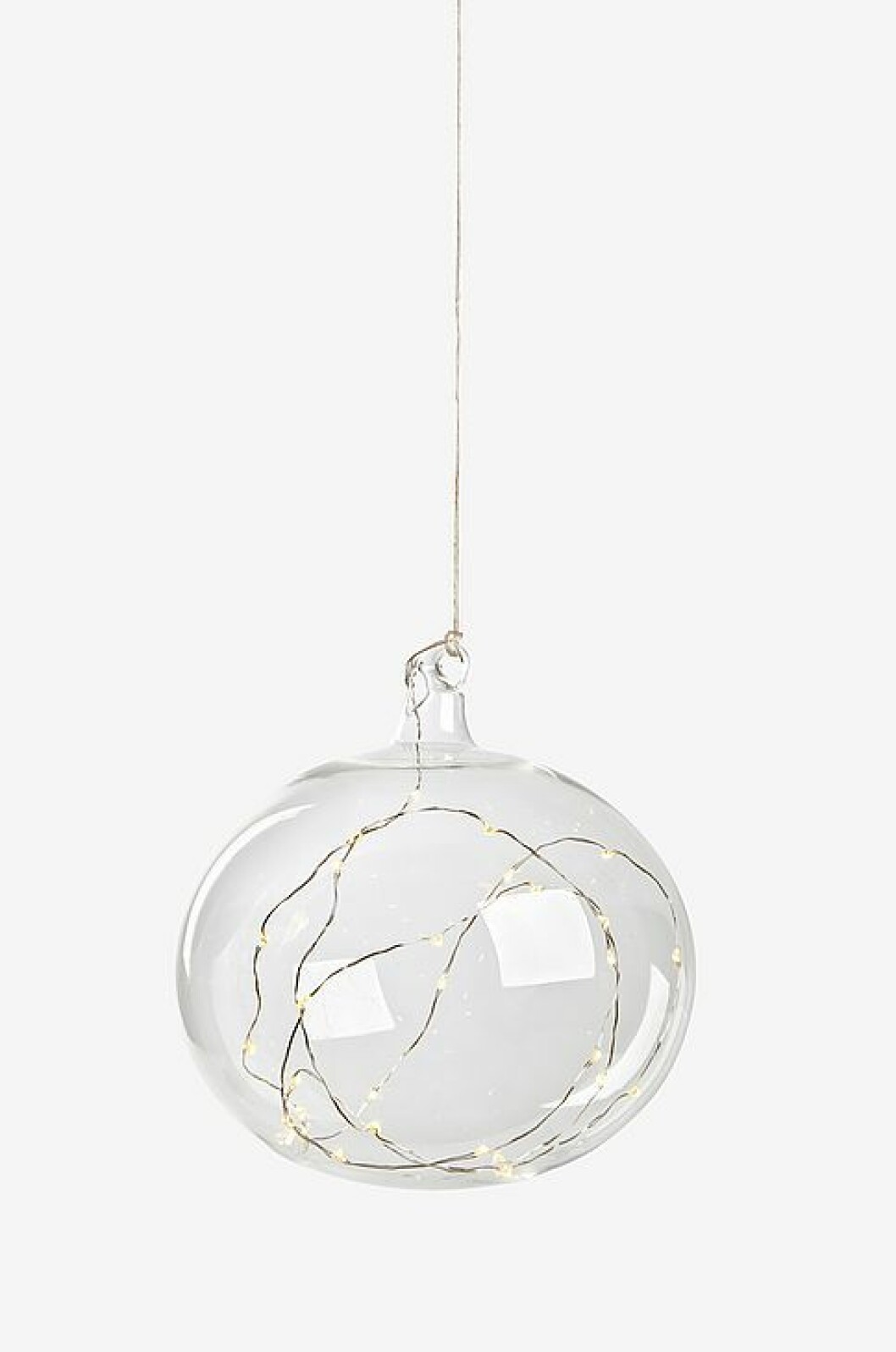 Glaskula med lampor i