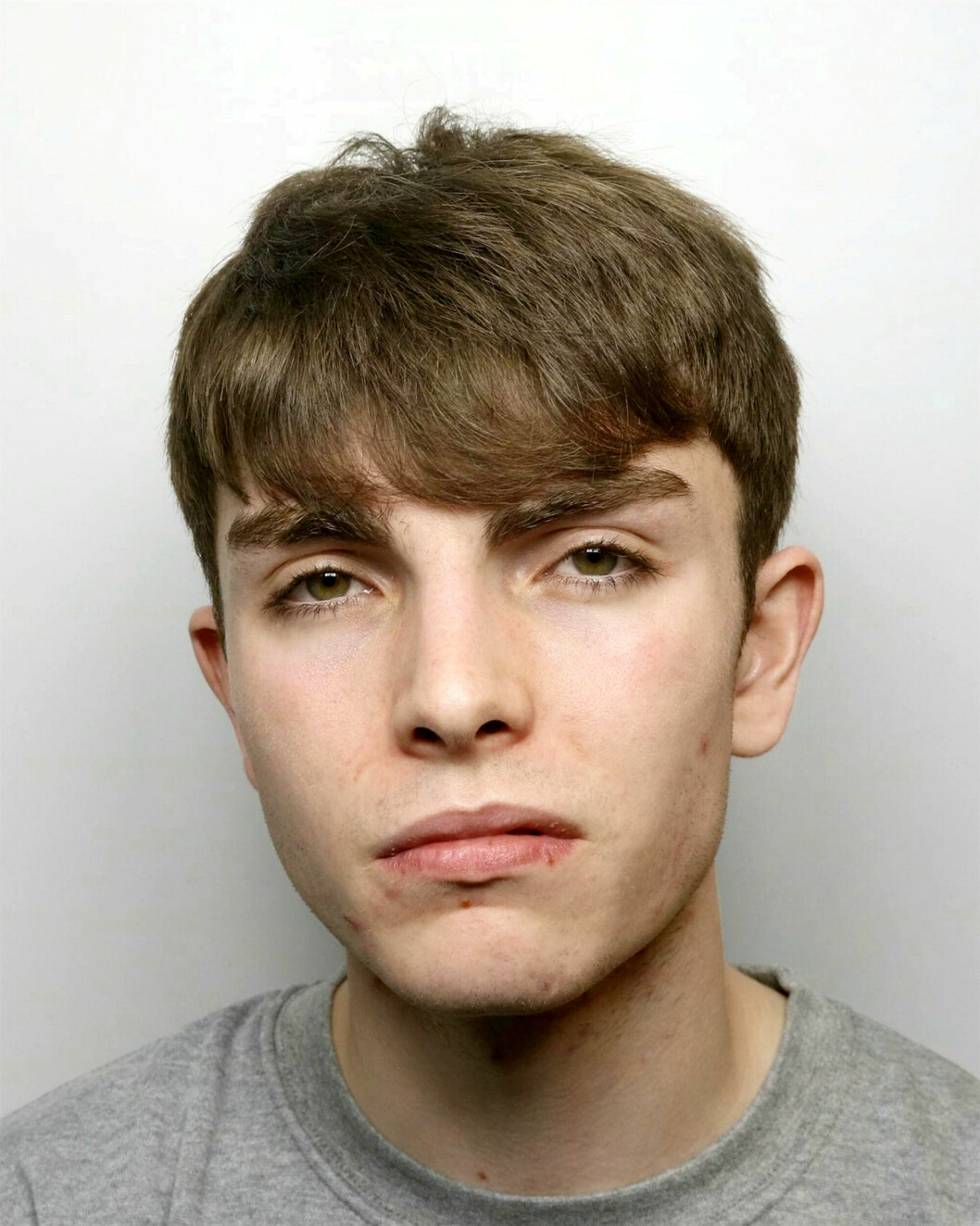 Expojkvännen Thomas Griffith, 17, hade flera sår i ansiktet efter mordet på Ellie Gould.