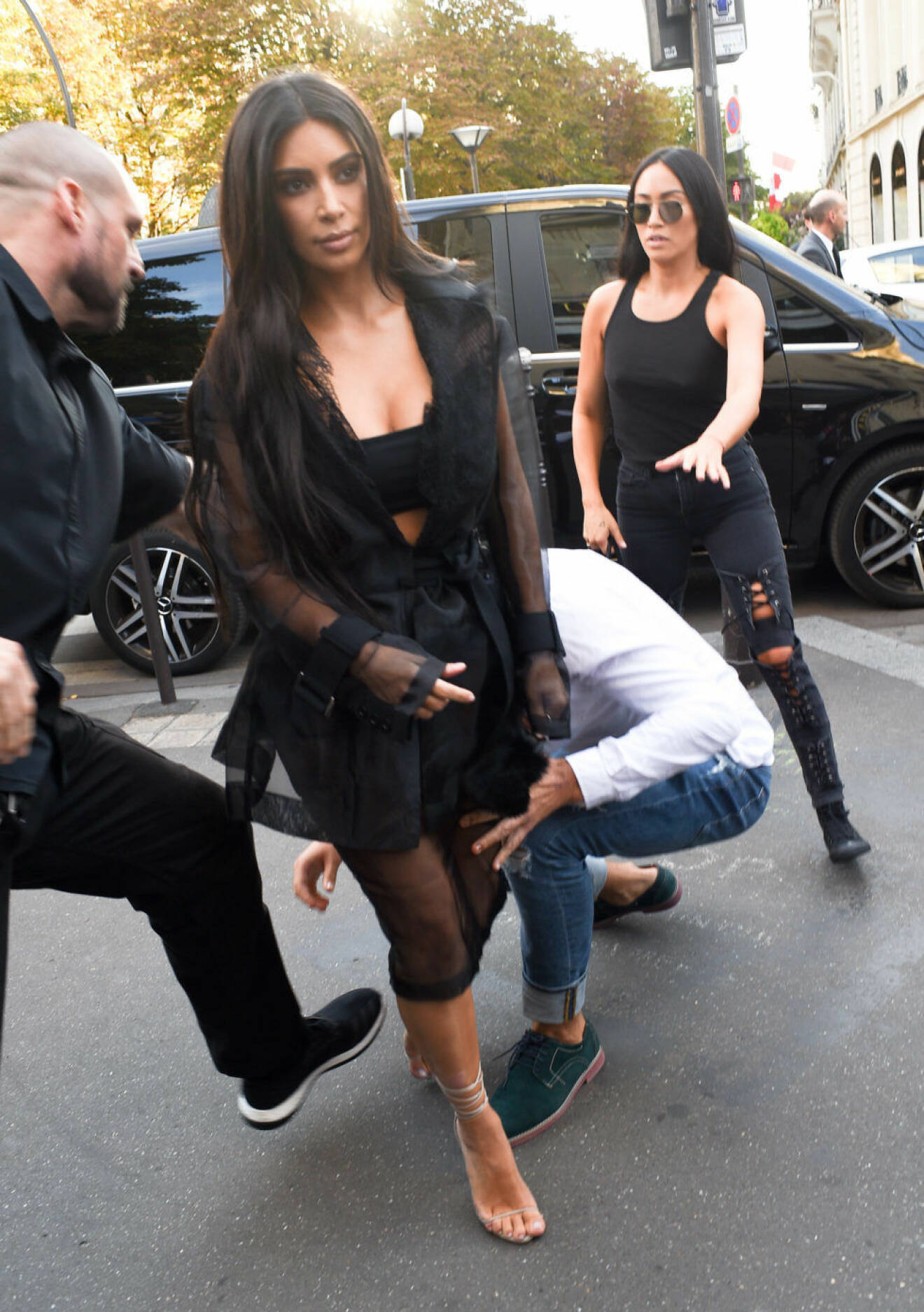 Celebrity pranker Vitalii Sediuk strikes again, this time grabbing Kim Kardashian at LAvenue restaurant in Paris