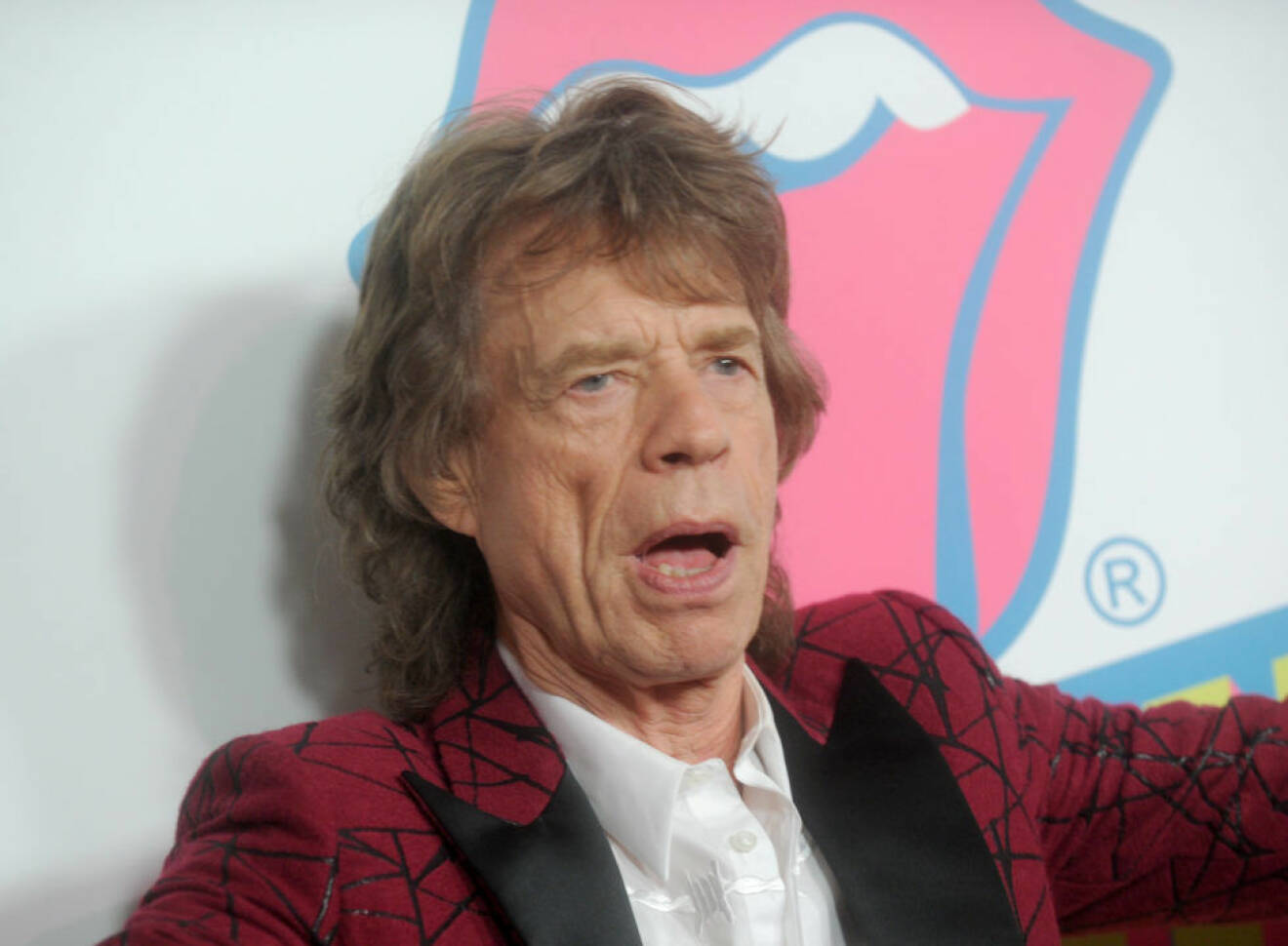 Mick Jagger attends The Rolling Stones exhibitionism opening night at Industria Super Studio