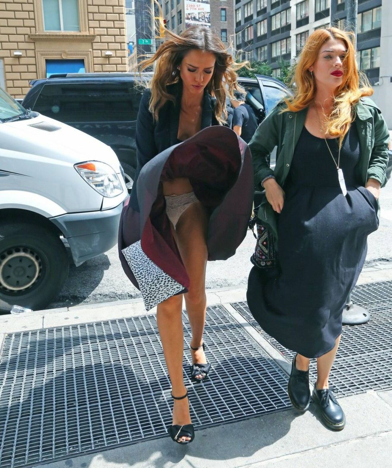 EXCLUSIVE: Jessica Alba wardrobe malfunction on windy day in NYC