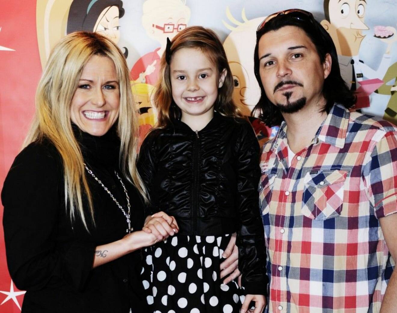 Annika Ljungberg med exmaken Jens och dottern Molly. Foto: IBL