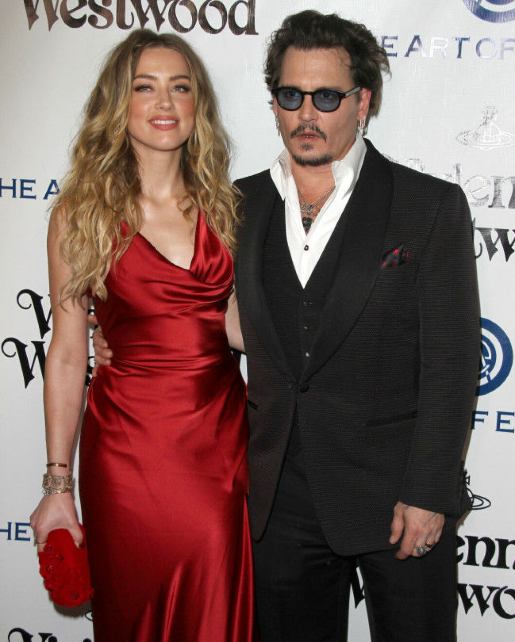 Johnny Depp och Amber Heard under muntrare tider. Johnny Depp och Amber Heard under muntrare tider.