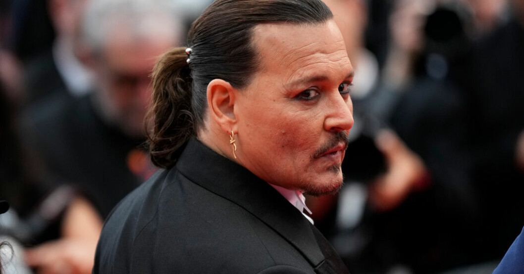 Johnny Depp möts av ett stort pressuppbåd på filmfestivalen i Cannes. Johnny Depp om skandalen: Fruktansvärd fiktion
