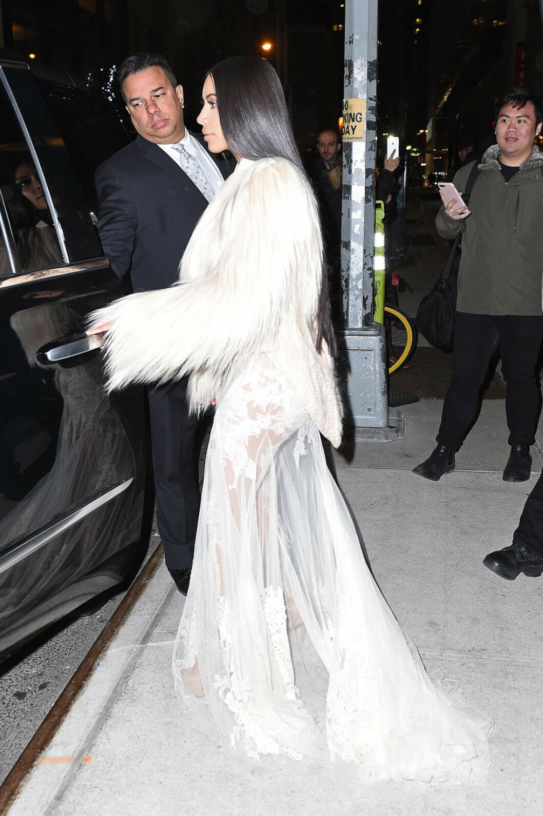 Kim Kardashian and Kendall Jenner make heads turn in revealing lace dresses on their way to the Oceans 8 movie set