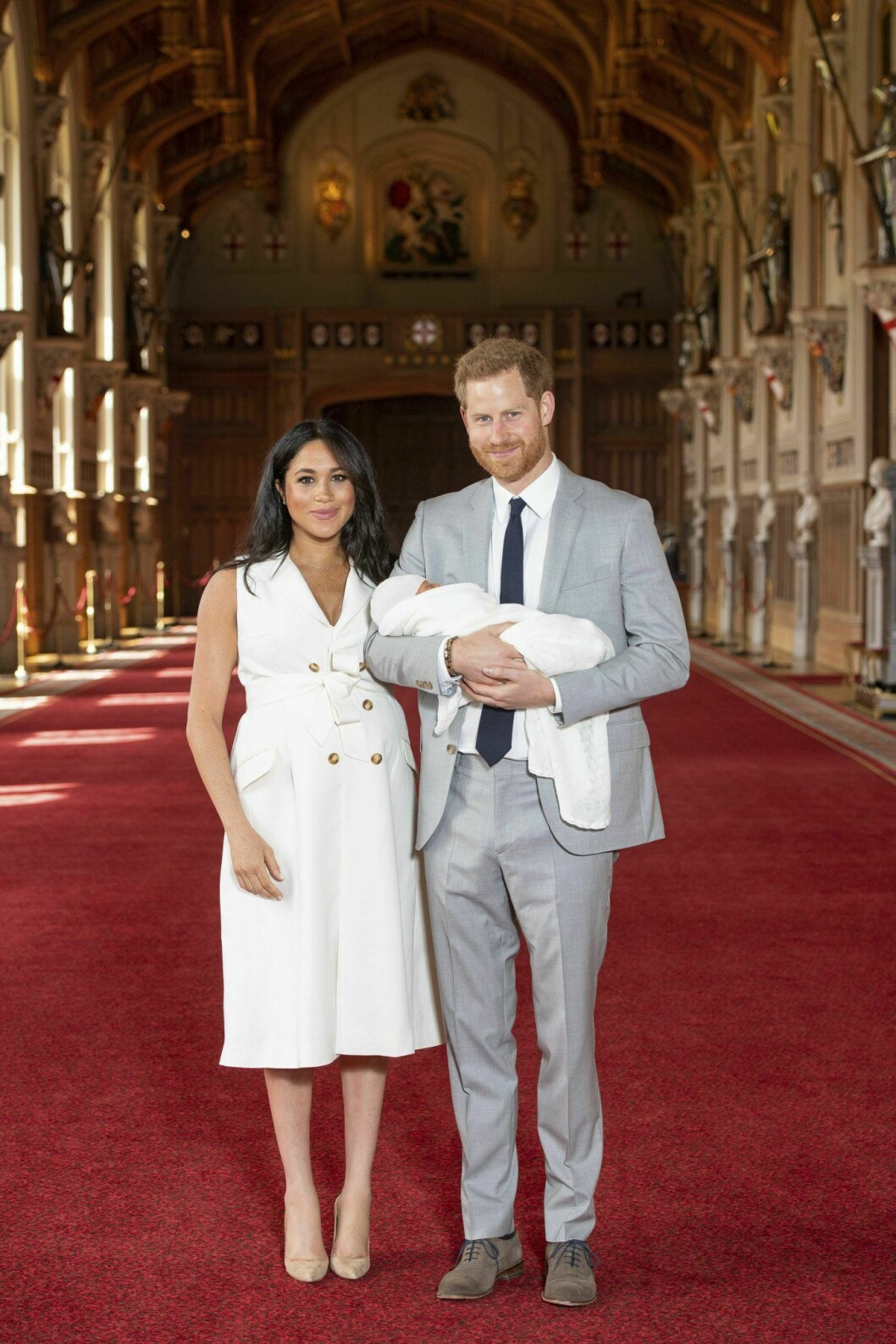 Meghan Markle och prins Harry med sin son.