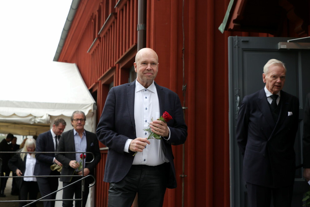 Lasse Kronér, bredvid skymtas även Carl Jan Granqvist.