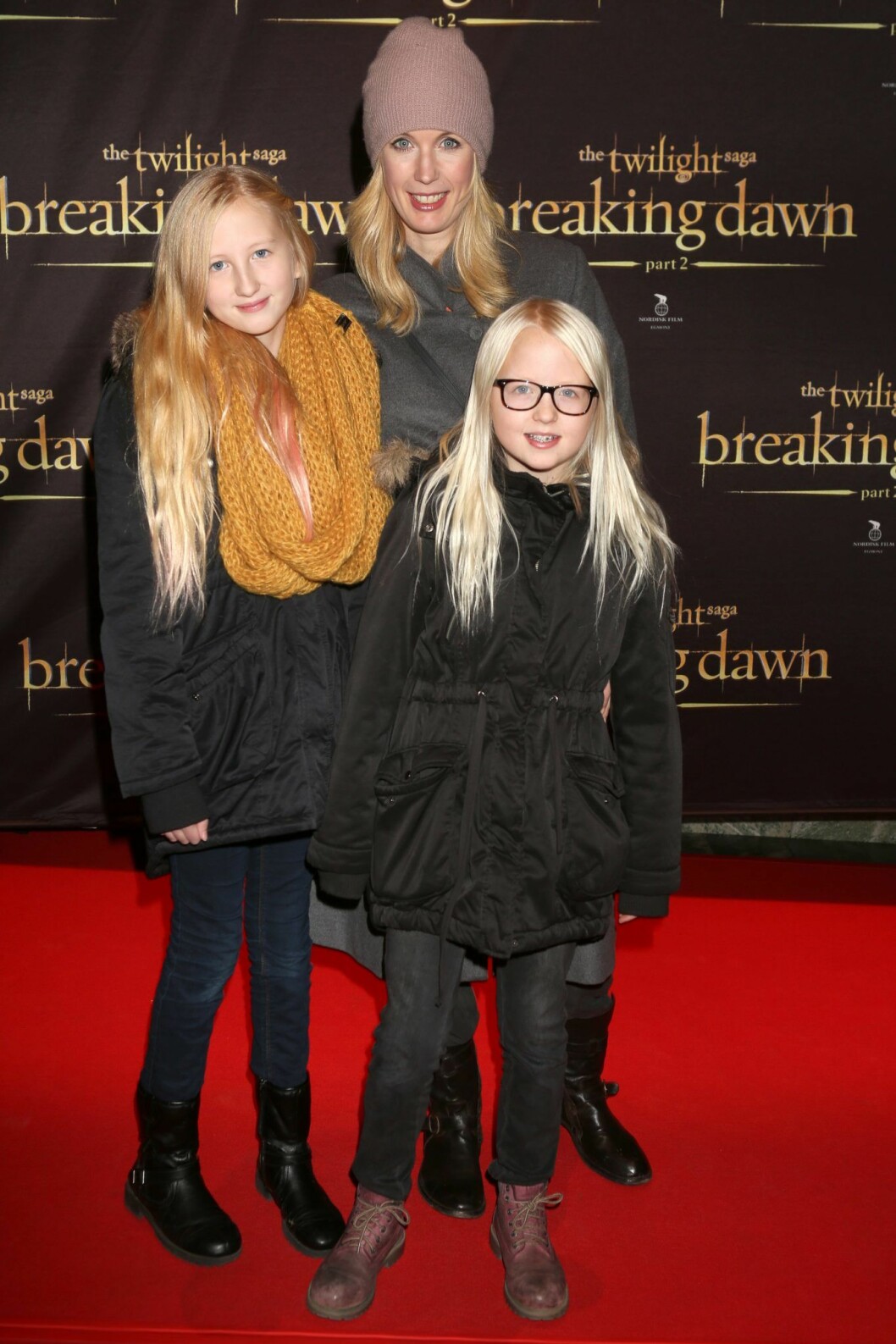 Kitty och Mika tillsammans med sin mamma Jenny år 2012. Foto: Charlotte Brunzell/TT Jenny Strömstedt med Kitty och Mika