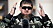 Ramzan Kadyrov iklädd militäruniform och solglasögon.