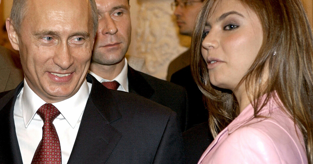 Vladimir Putin och Alina Kabajeva på ett möte med Rysslands olympiska lag i Moskva 2004.