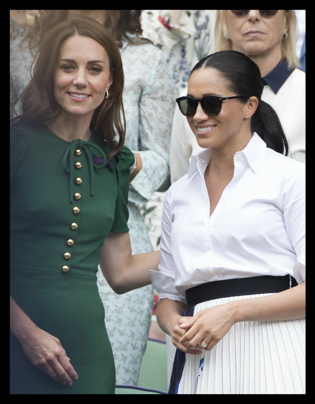 Kate Middleton la en tröstande hand på Meghan när vännen Serena Williams förlorade matchen.