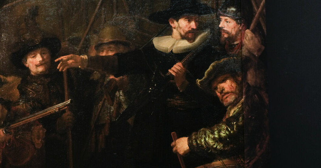 Utsnitt ur Rembrandts berömda målning "Nattvakten". Arkivbild Rembrandtmuseum vill locka med tatueringar