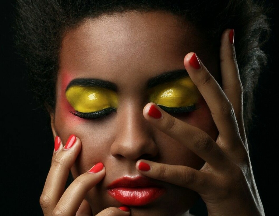 Beautiful black woman with glossy makeup
